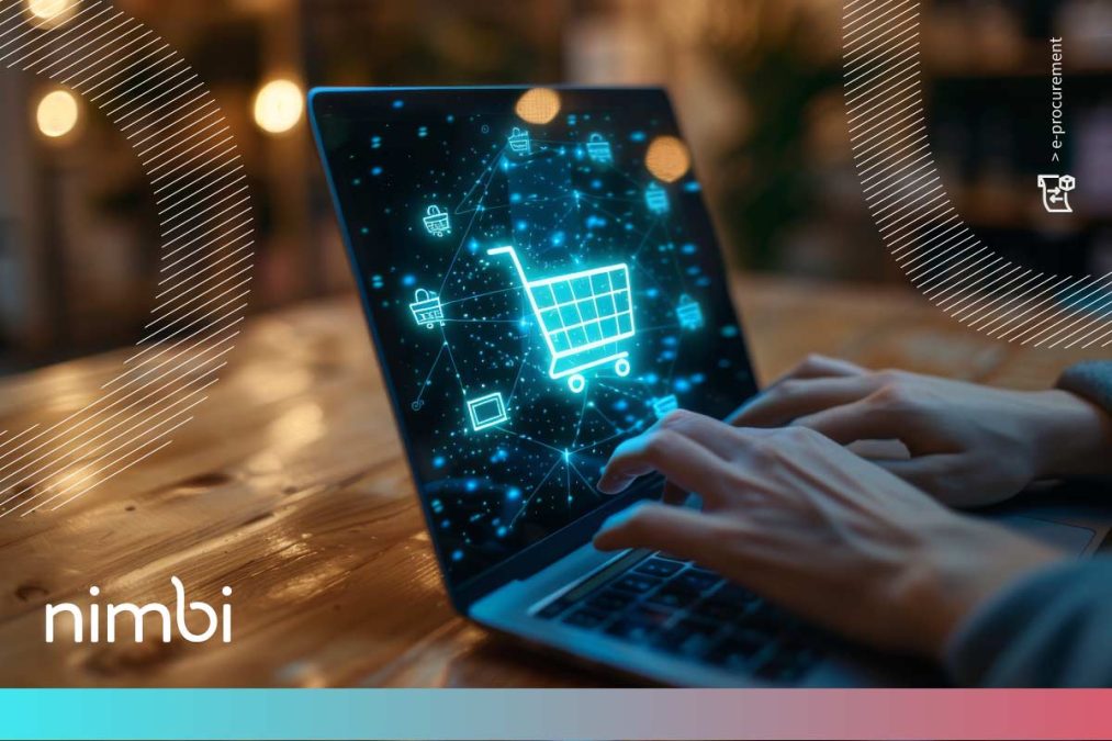 A imagem mostra um laptop em uso, com a tela destacando um ícone digital de um carrinho de compras, simbolizando o processo de e-procurement. A cena está ambientada em um espaço de trabalho, com iluminação suave ao fundo. O conceito de tecnologia no setor de compras é enfatizado pela interface futurista, representando a automação e digitalização nas compras corporativas, que facilita a gestão e eficiência dos processos de aquisição. A marca Nimbi está presente no canto inferior esquerdo, sugerindo uma solução tecnológica voltada para esse setor.