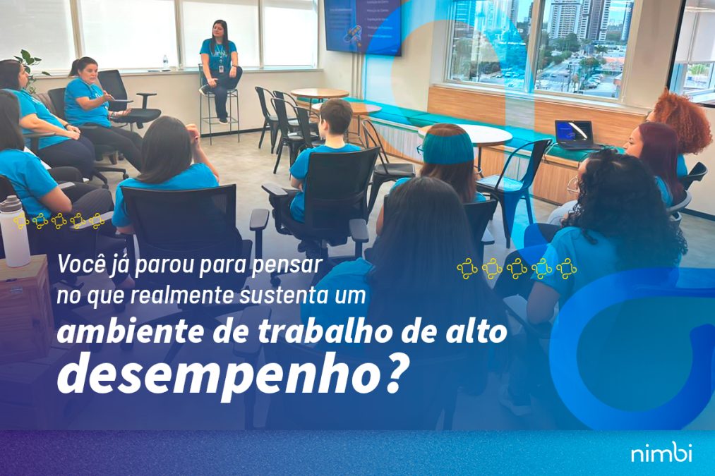 Pessoas numa sala falando sobre comprometimento em um ambiente de trabalho de alto desempenho